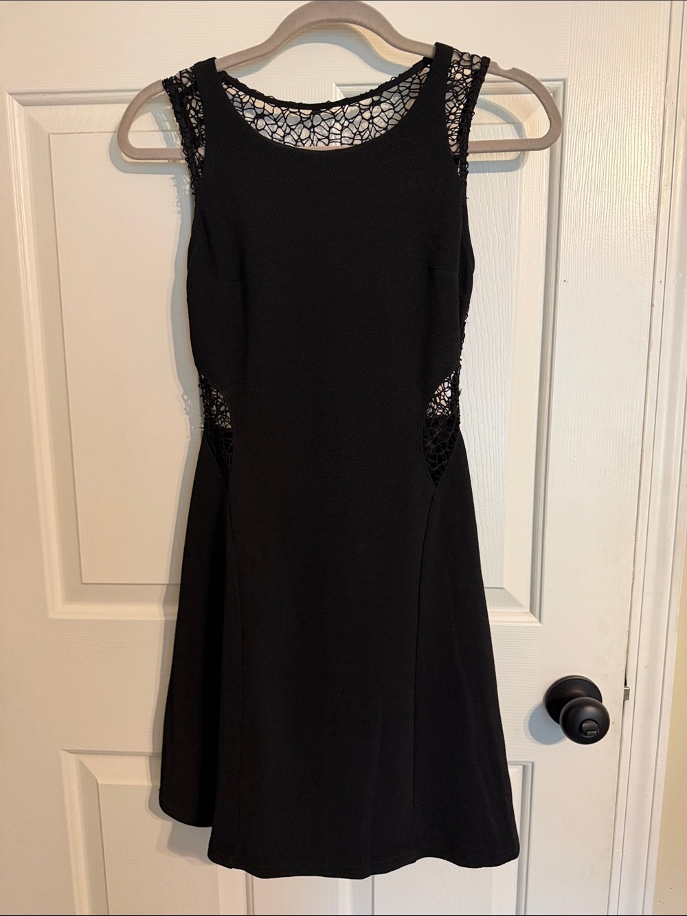 Sleeveless Black Mini Dress with Lace Insets